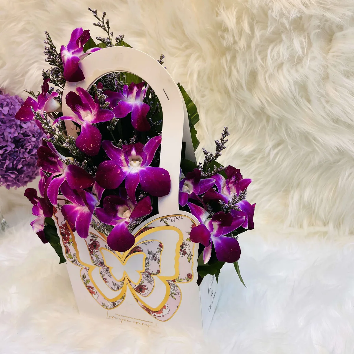 Orchid & Limu Arrangement in Butterfly Hanging Gift Bag