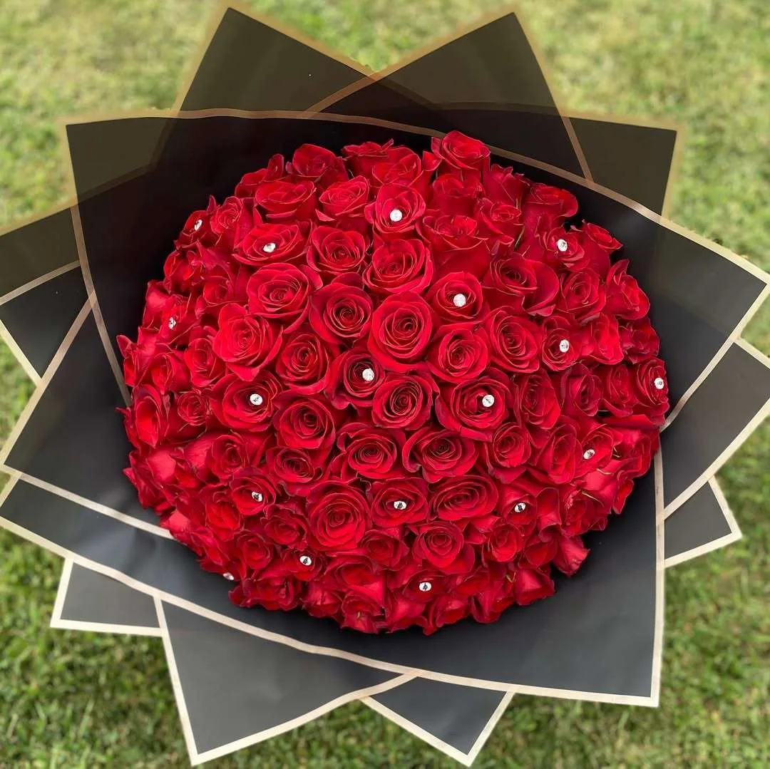 100 Red Roses with Crystal Accents in Black & Gold Wrap