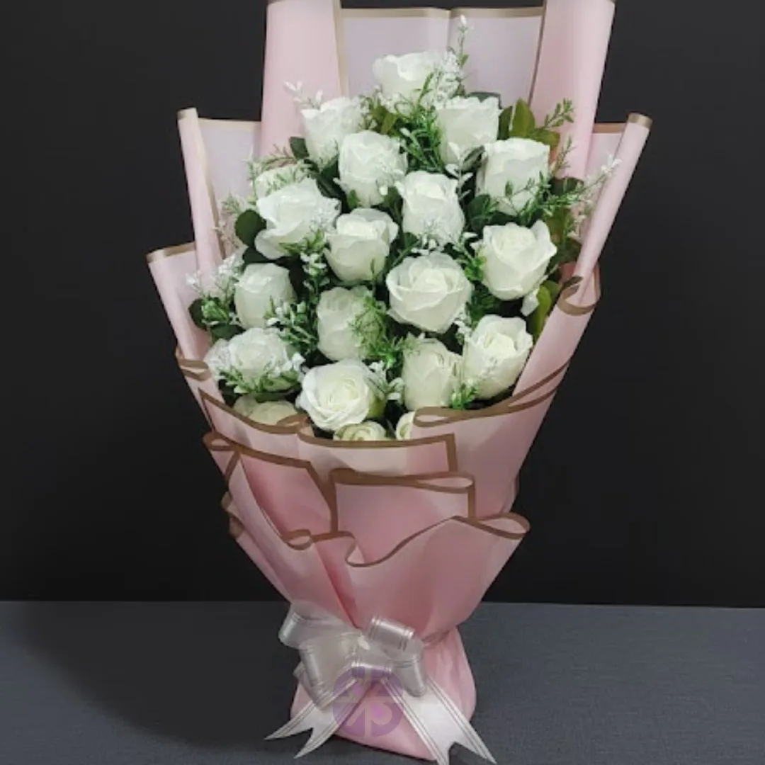 Sweet Serenity Artificial White Rose Stand Bouquet in Pink Wrap