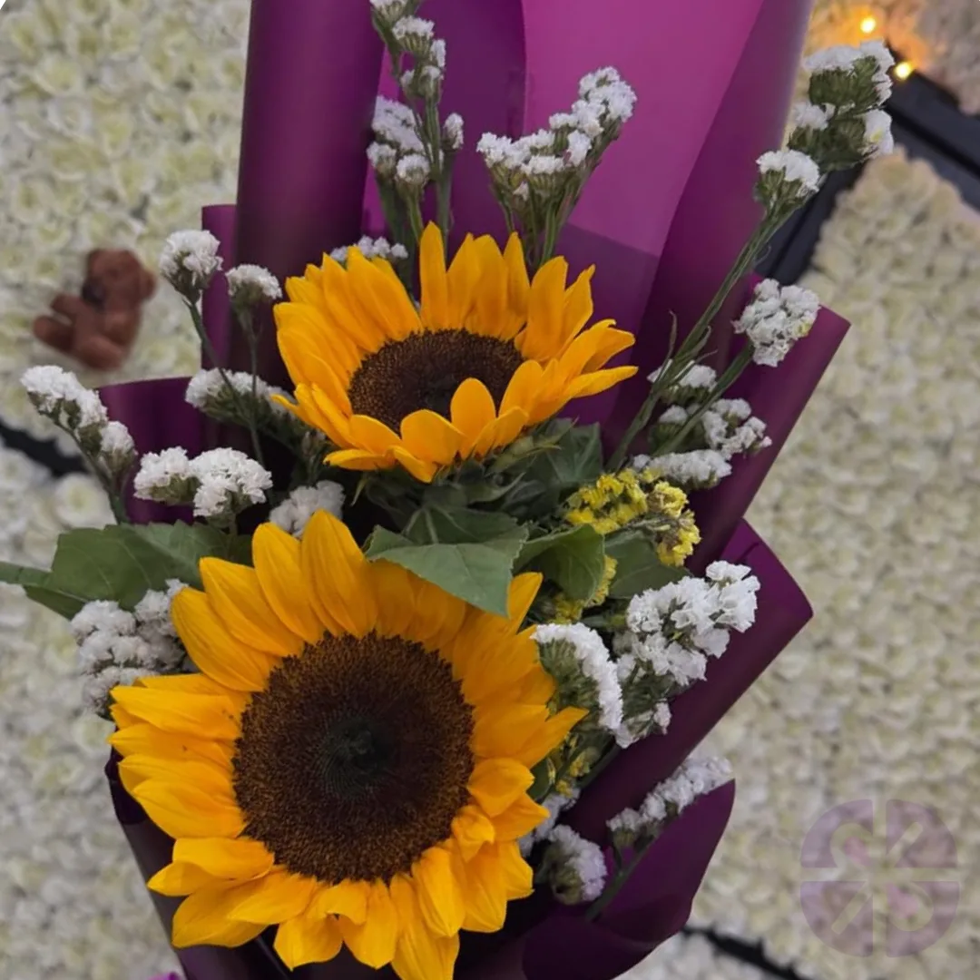 The Purple Glow Two Sunflowers & White Bloom Bouquet