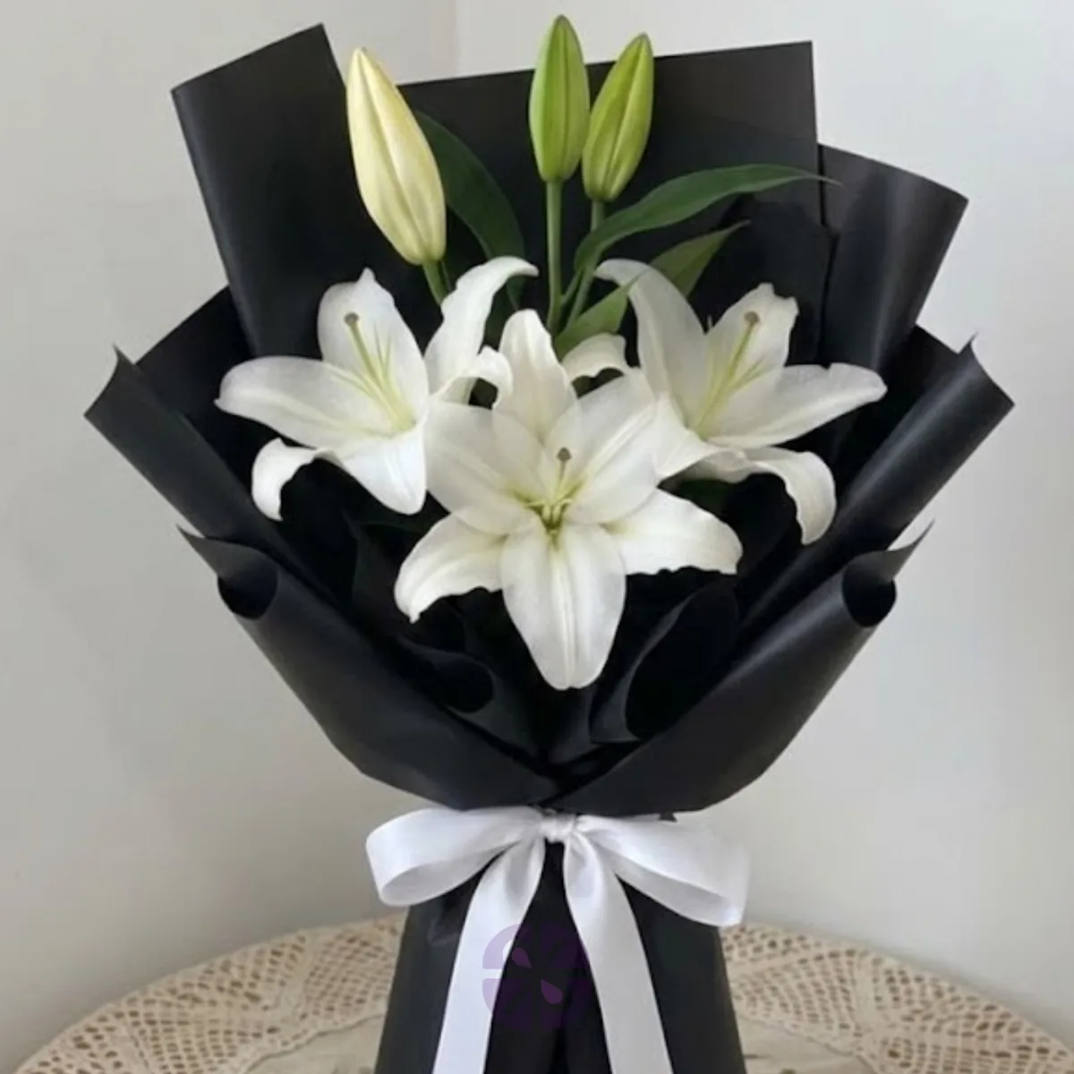 Premium White Oriental Lily Hand Bouquet in Black Wrap