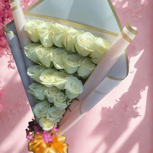 White Rose Cone Bouquet with Golden Bow & Touch of Pink
