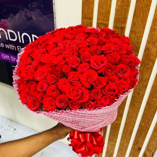 Classic 100 Red Roses Bouquet with Elegant Red Net Wrapping & Ribbon – Perfect for Proposal, Anniversary & Valentine’s Day