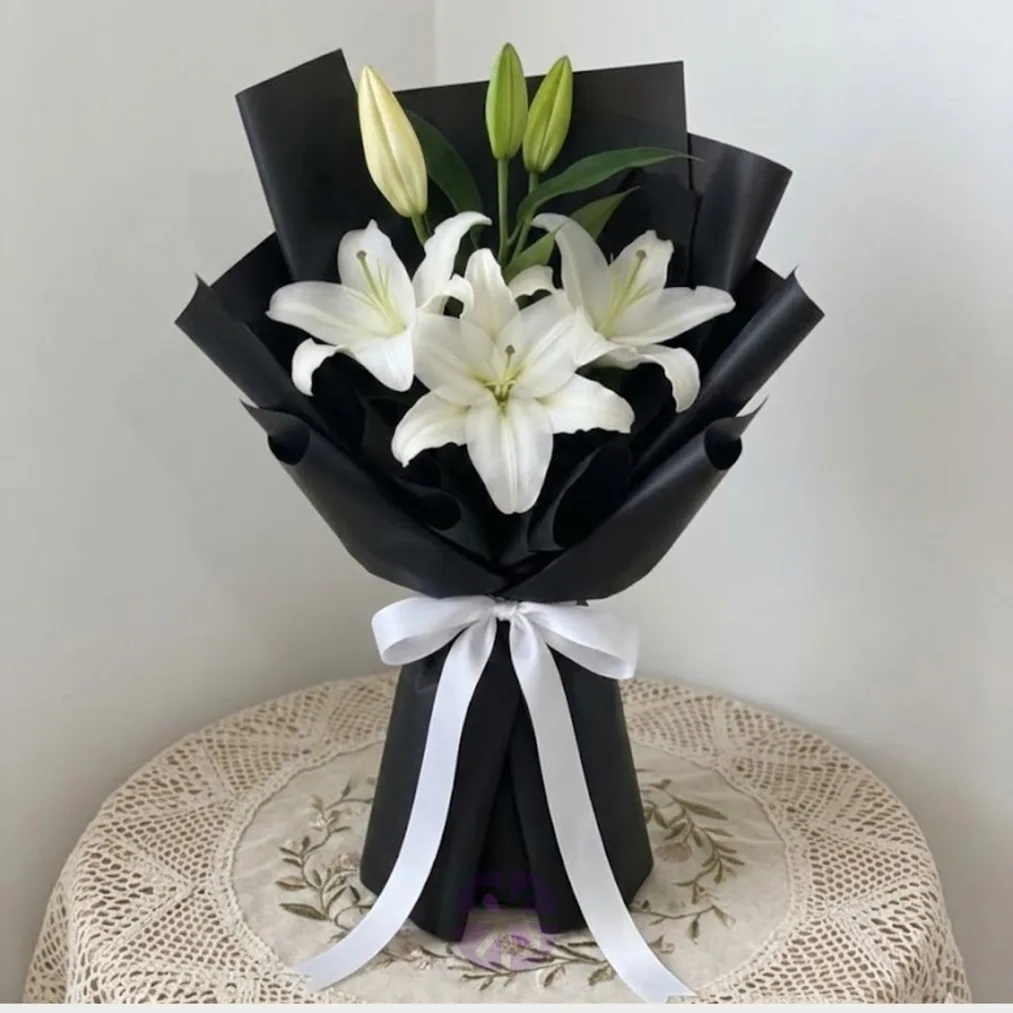 Premium White Oriental Lily Hand Bouquet in Black Wrap