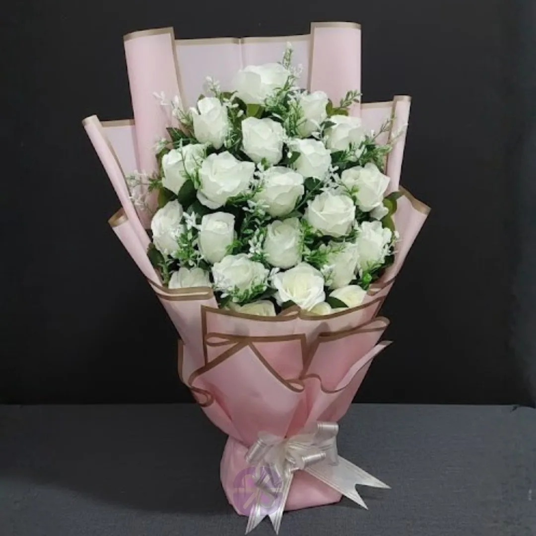 Sweet Serenity Artificial White Rose Stand Bouquet in Pink Wrap