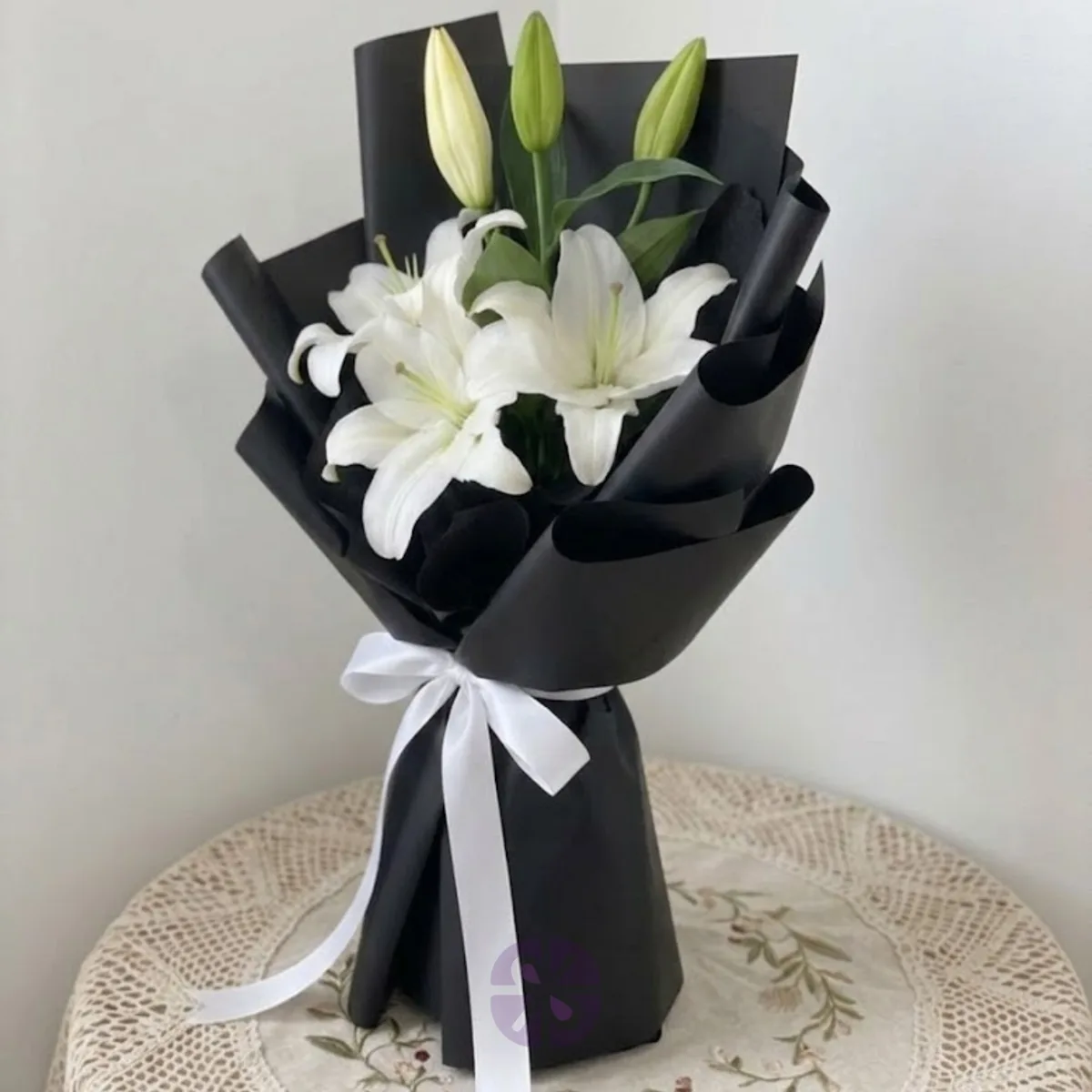 Premium White Oriental Lily Hand Bouquet in Black Wrap