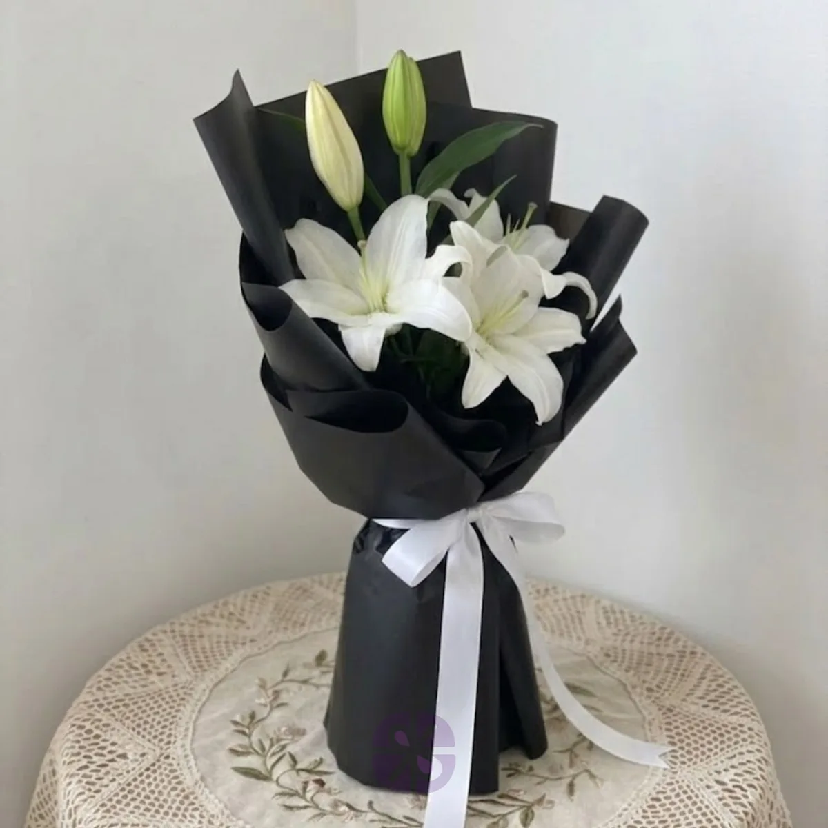 Premium White Oriental Lily Hand Bouquet in Black Wrap