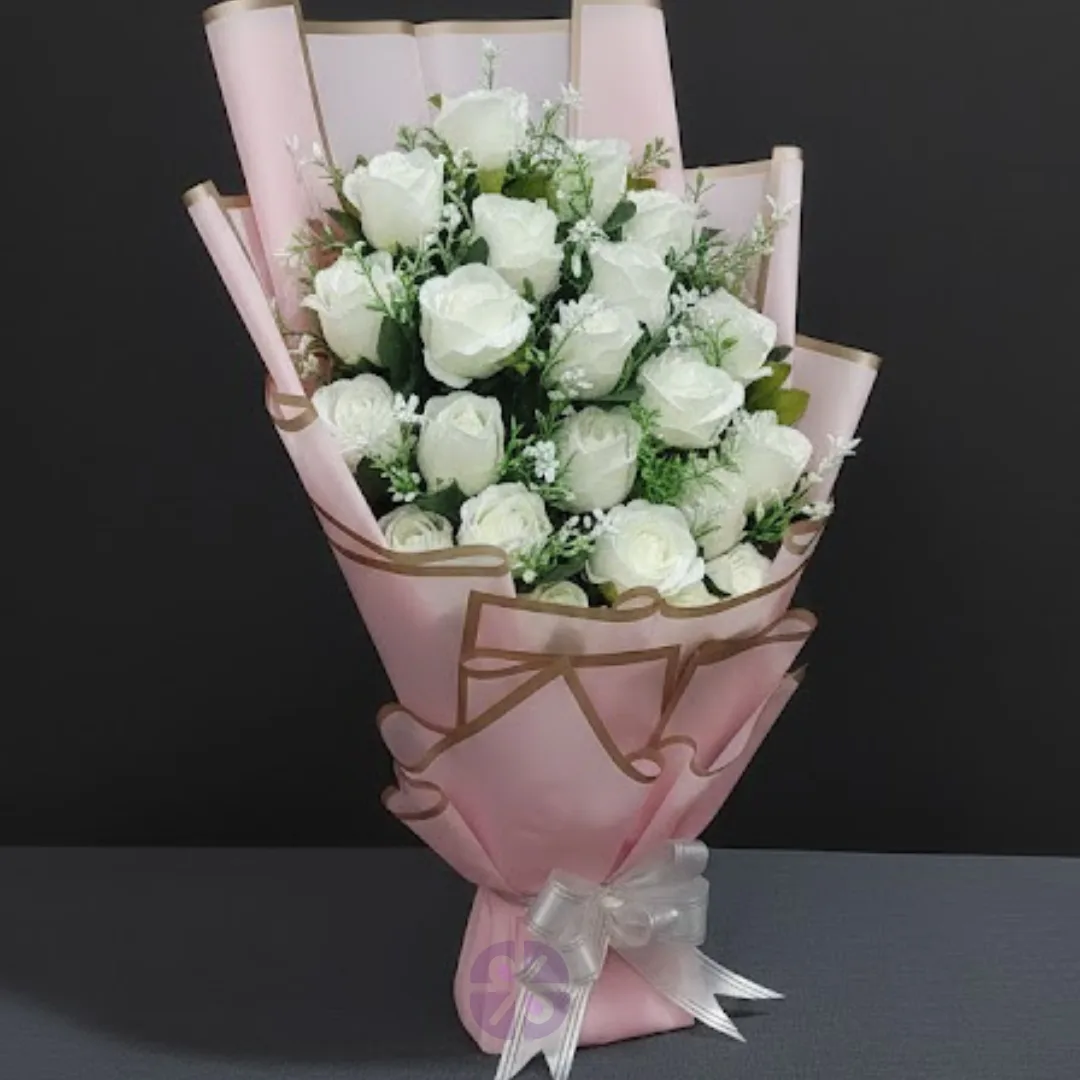 Sweet Serenity Artificial White Rose Stand Bouquet in Pink Wrap